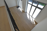 Bilck in das Wohnzimmer - I Loft Wohnung im Rius Carré I Gartenhaus I Einbauküche I erstklassige Ausstattung I